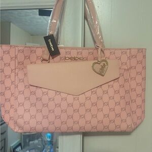 Beautiful NWT Bebe Pink Patterned Tote with Heart Charm